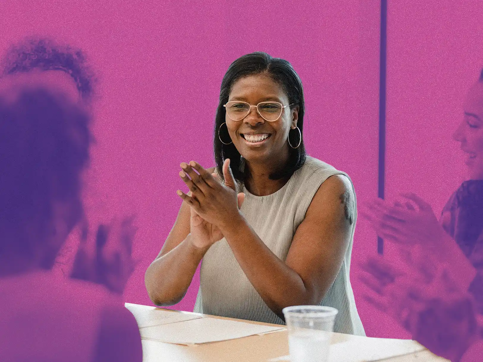 woman sitting and clapping