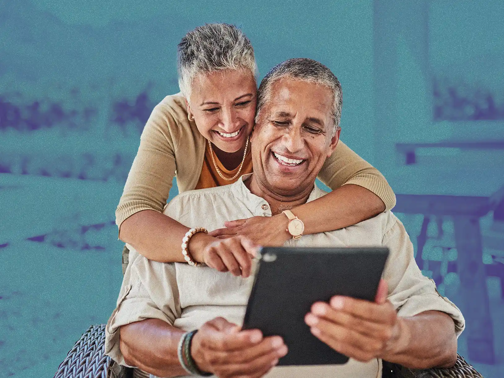 Older couple using a tablet to donate. Get involved to also donate!