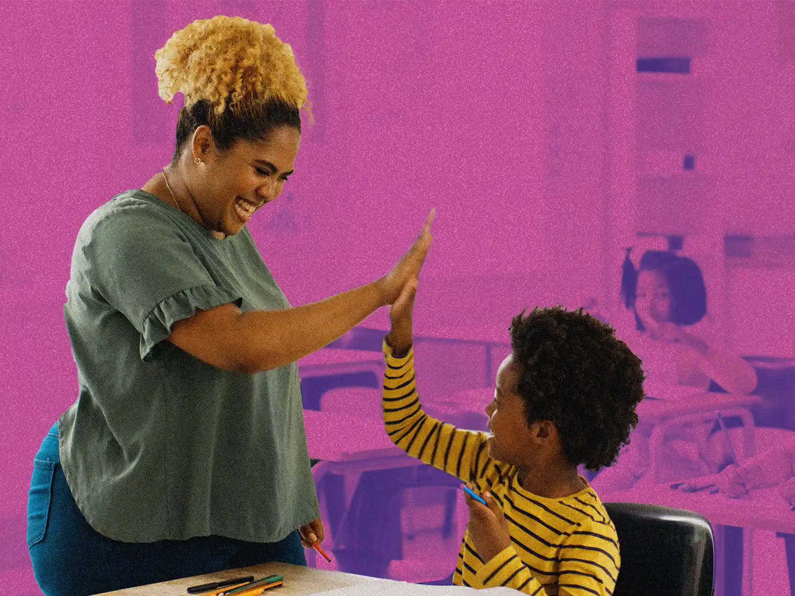 Woman high-fiving a young boy sitting at a desk. Get involved to also help!