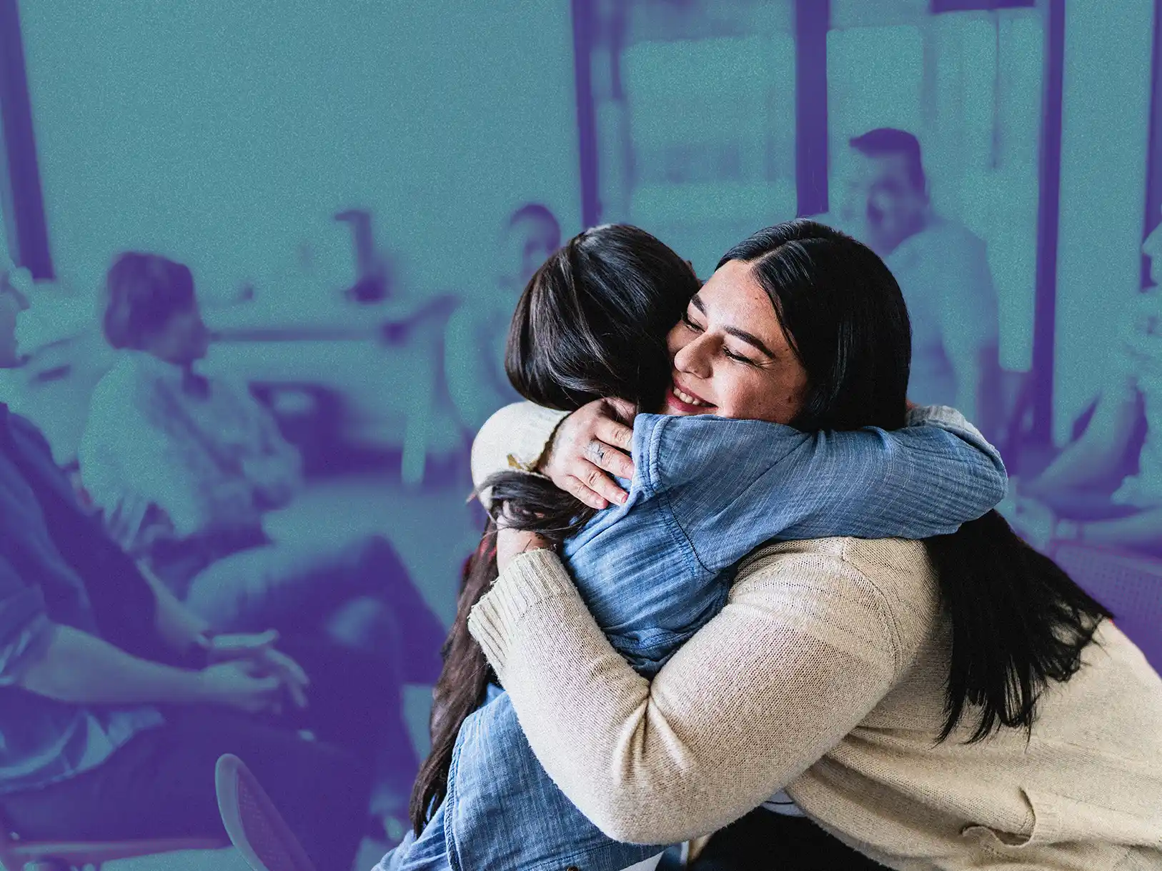 Two women hugging