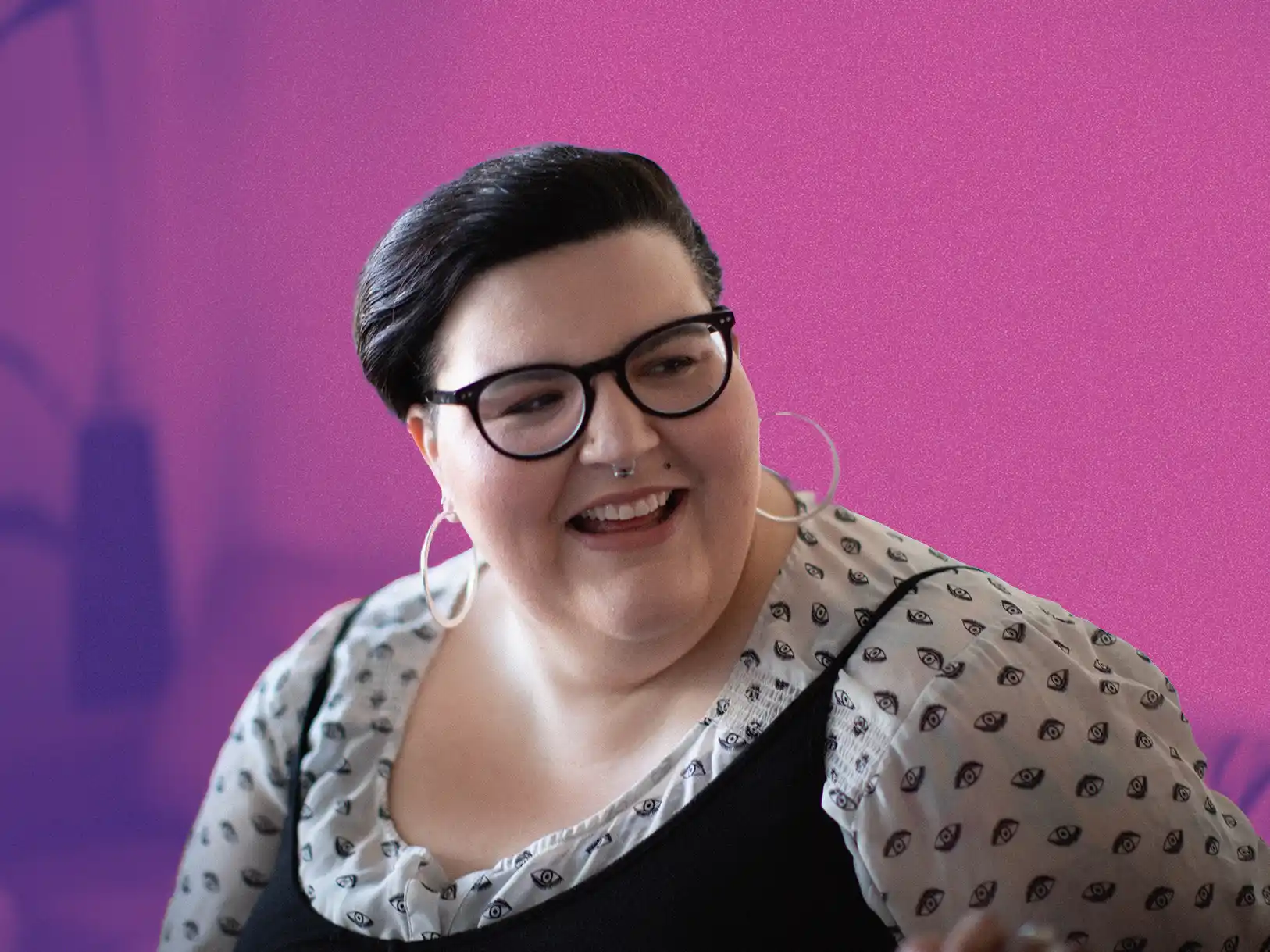 woman with a short haircut smiling