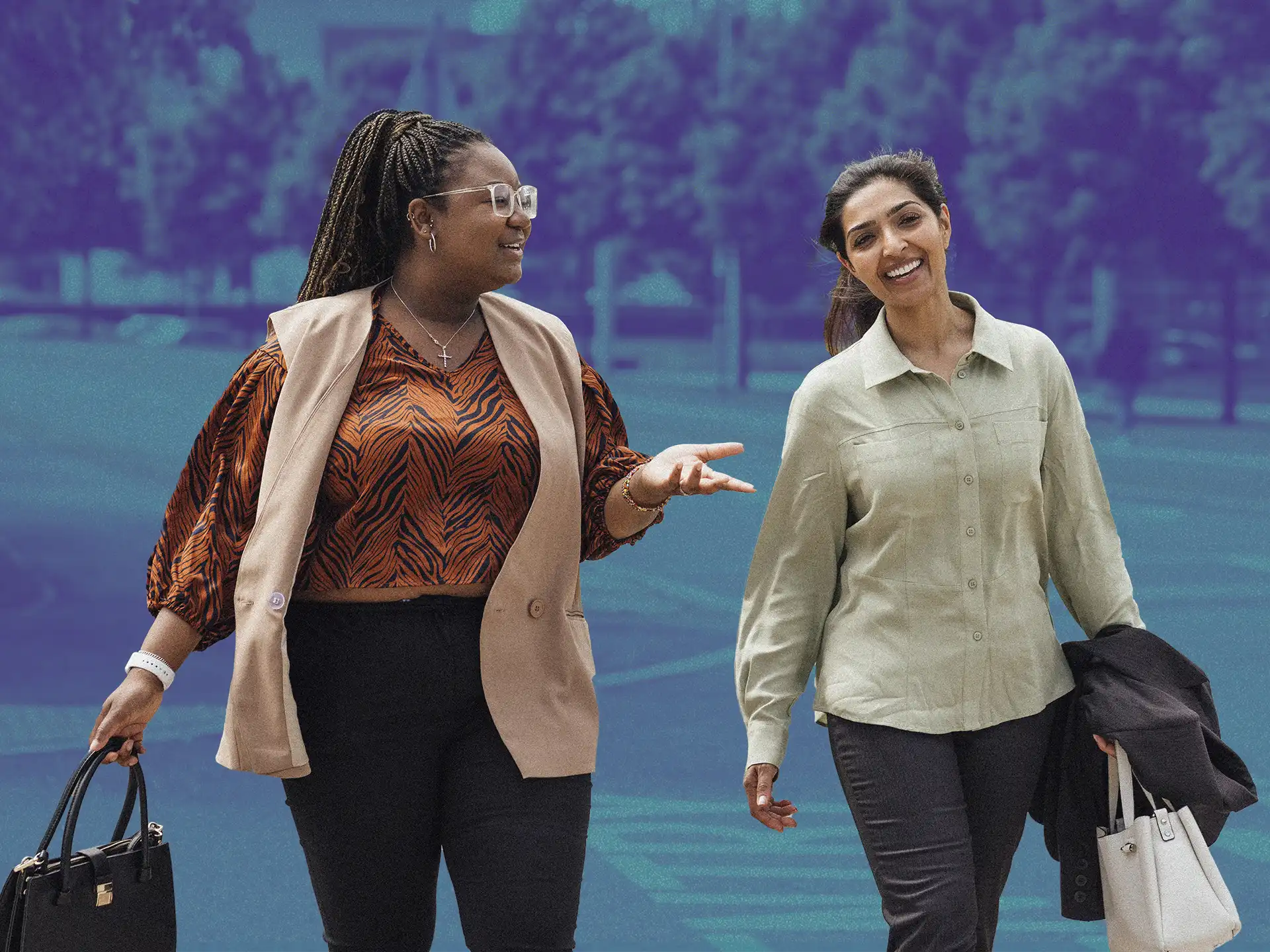 Two women walking outside and talking