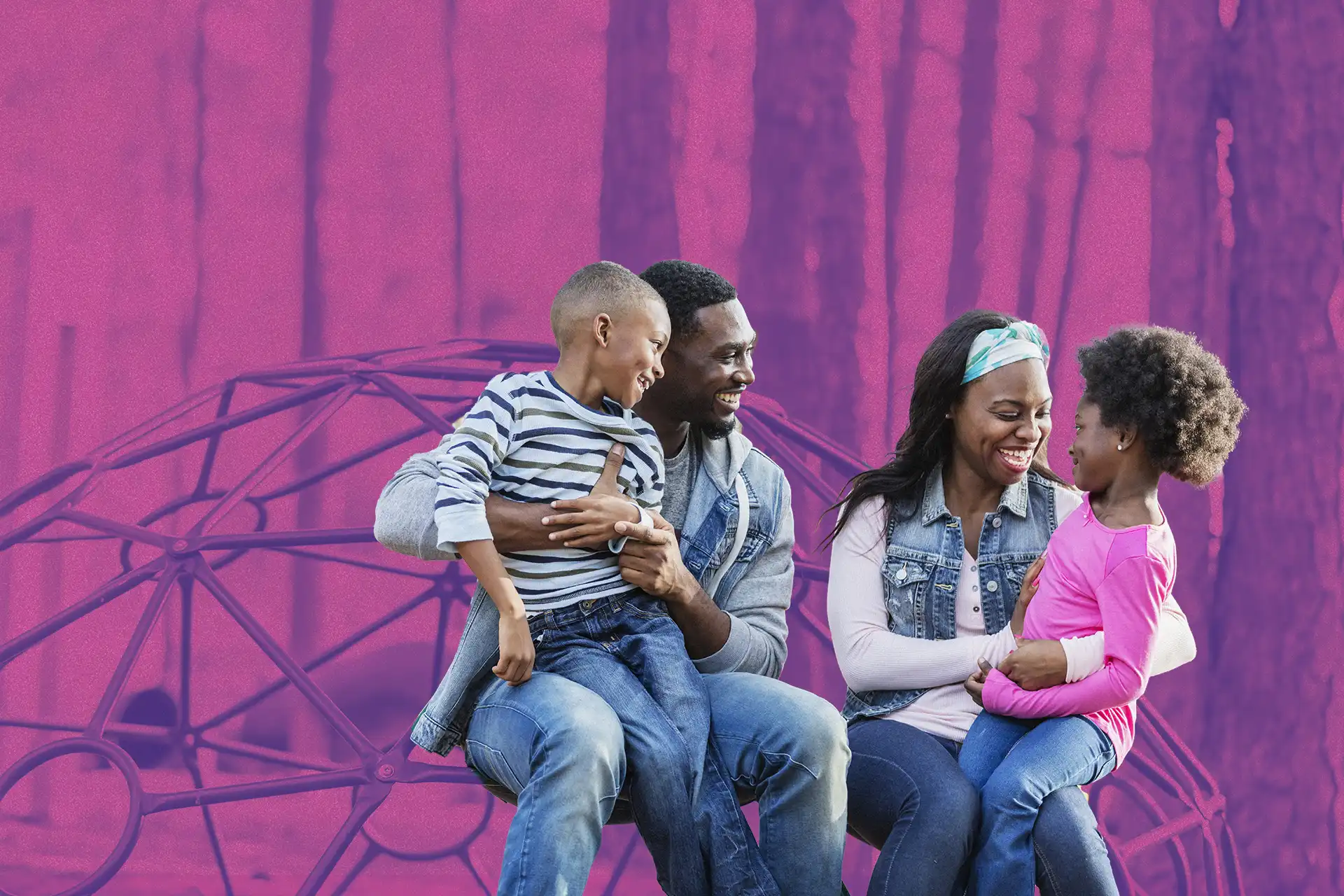 Family sitting together on the jungle gym