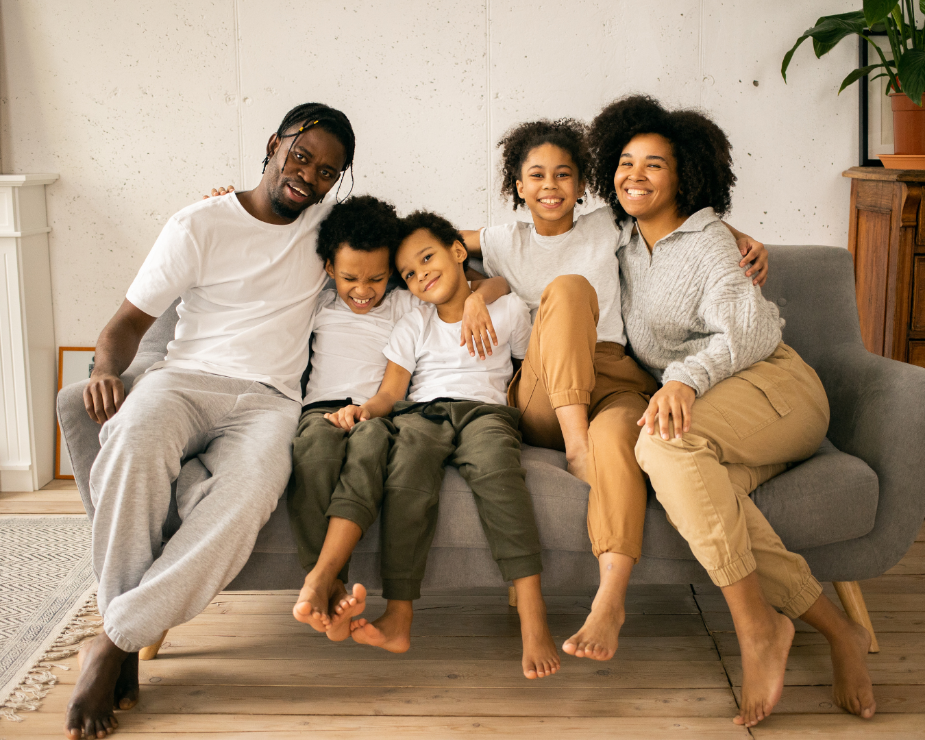 Family sitting on a couch